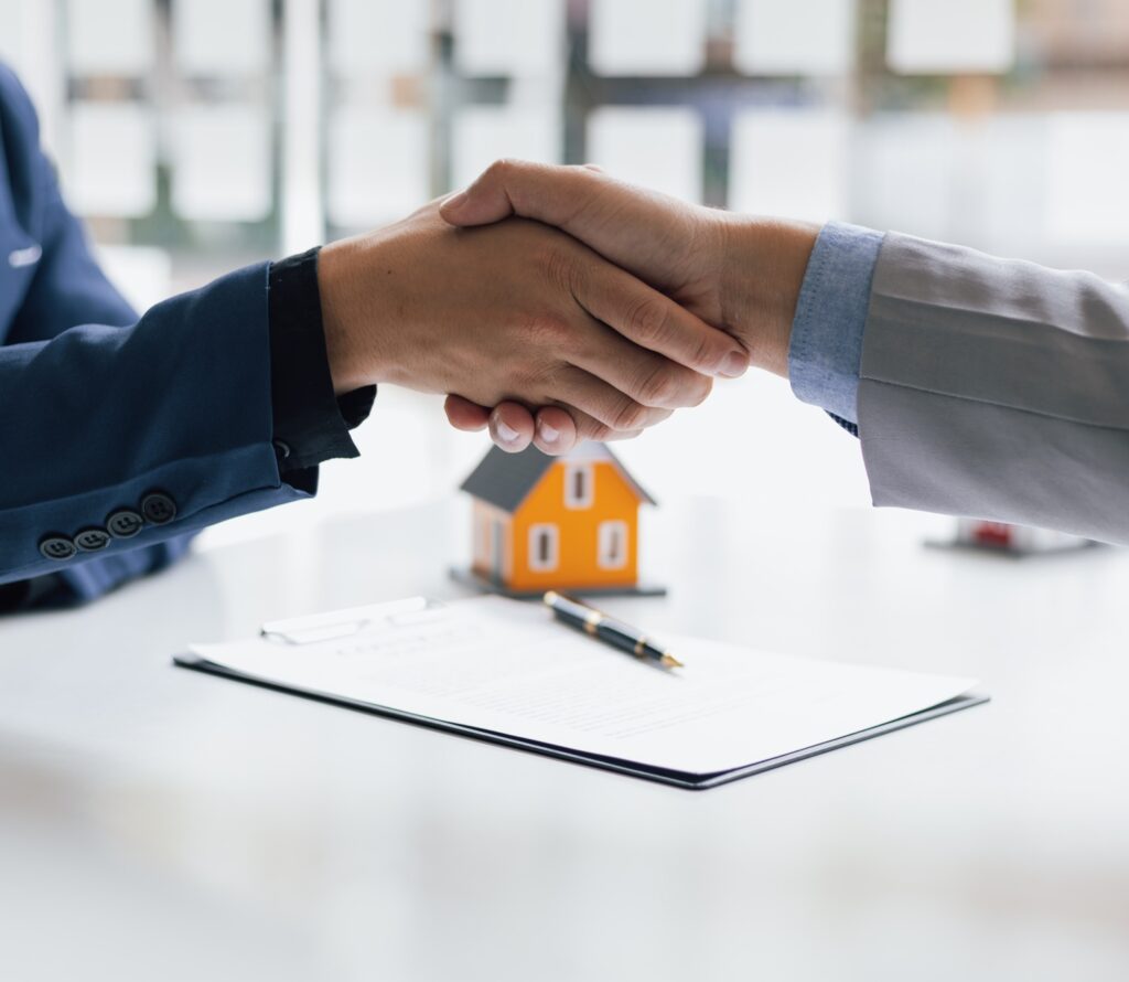 Businessman handshake after reaching a real estate deal.